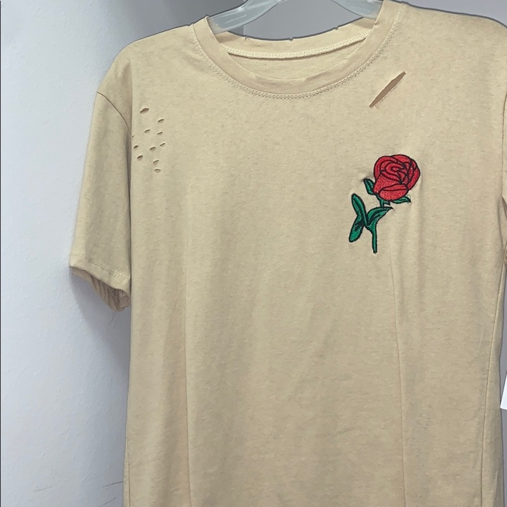 Tan Top with small rips and flower!! short sleeve